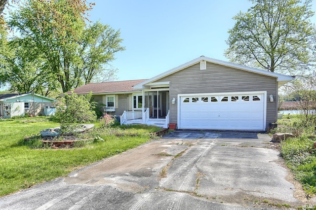 ranch-style home with a garage and a front yard