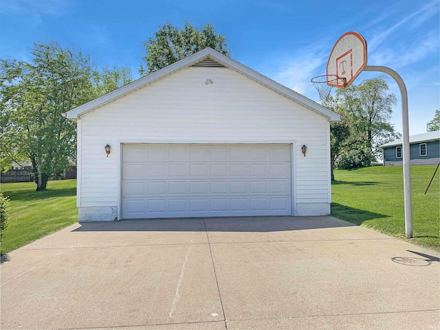 garage with a yard