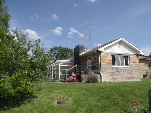 260 Lyons Ln, Heltonville, IN 47436 - back of property with a lawn