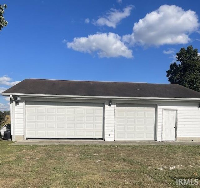 260 Lyons Ln, Heltonville, IN 47436 - garage with a lawn