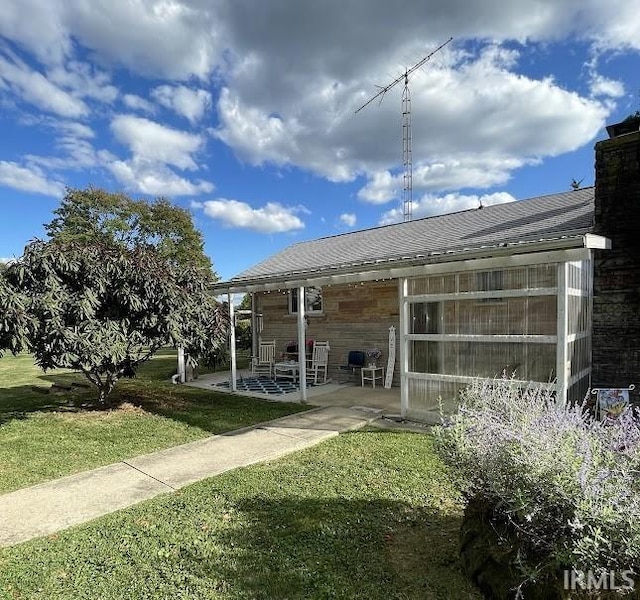 260 Lyons Ln, Heltonville, IN 47436 - exterior space featuring a patio area and a lawn