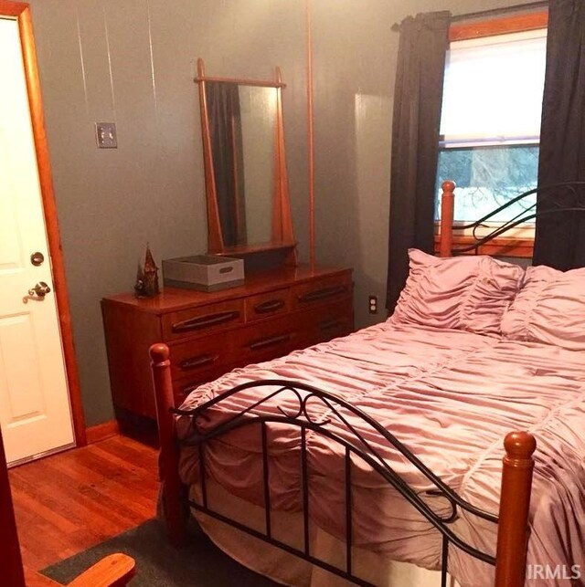 260 Lyons Ln, Heltonville, IN 47436 - bedroom featuring dark wood-type flooring