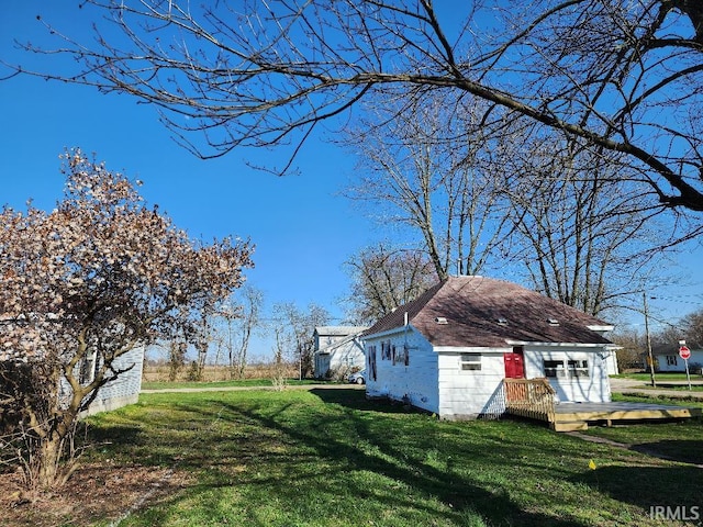 view of yard featuring a wooden deck