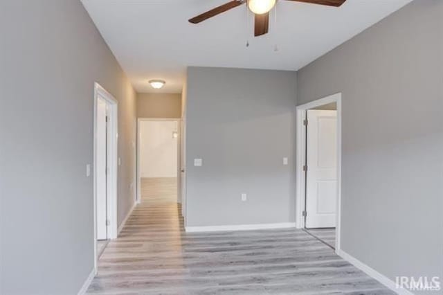 unfurnished room with ceiling fan and light hardwood / wood-style floors