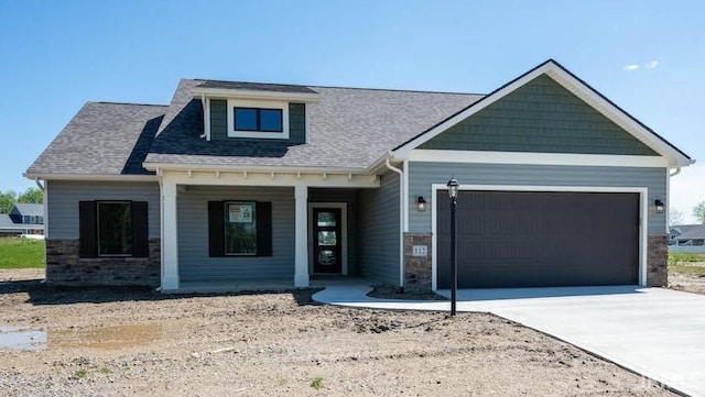 craftsman-style home with a garage