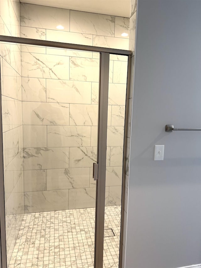 bathroom with an enclosed shower