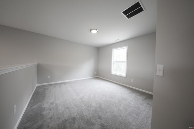 spare room with carpet