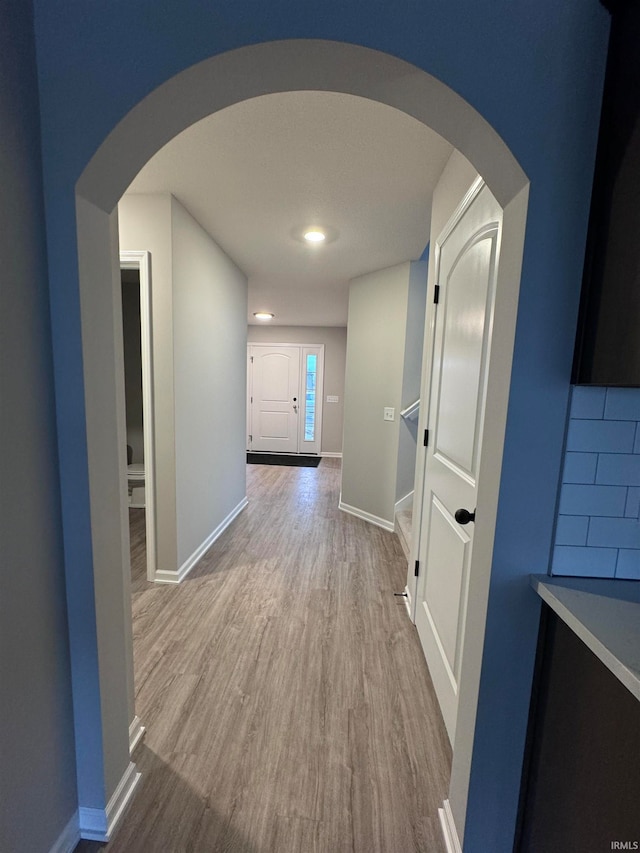 hall featuring wood-type flooring