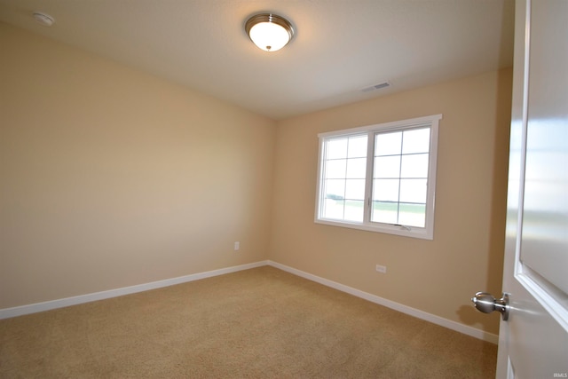 unfurnished room with carpet