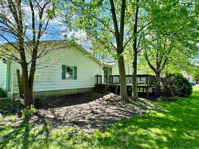 view of yard with a deck