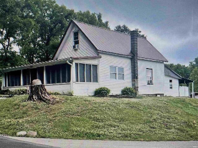 view of front of home with a front yard