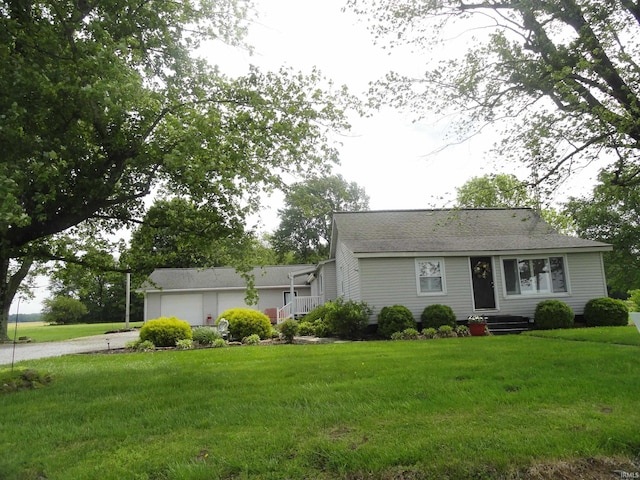 single story home with a front yard