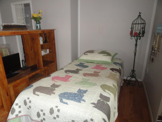 bedroom featuring hardwood / wood-style flooring