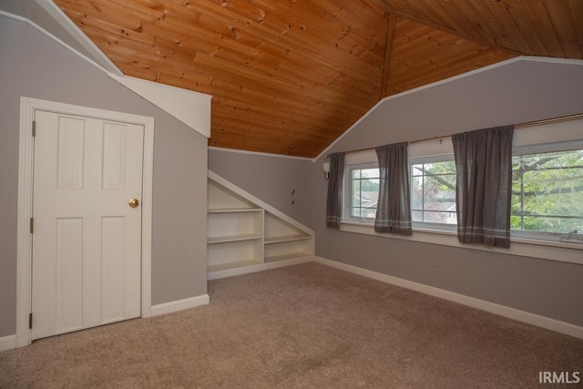 additional living space featuring wood ceiling, carpet flooring, and vaulted ceiling