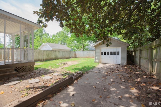 garage with a yard