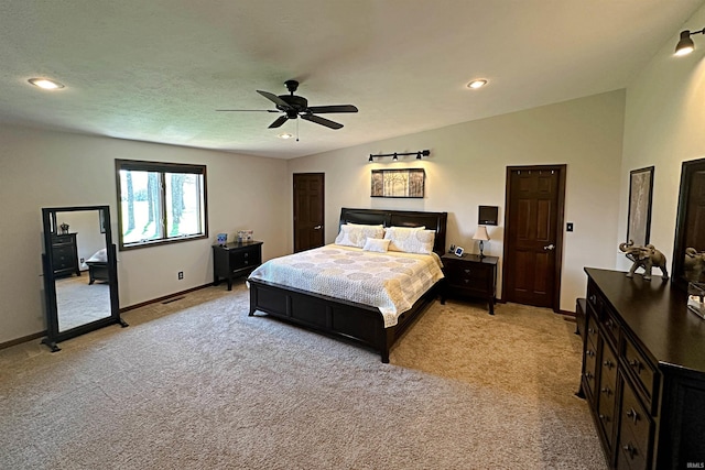 carpeted bedroom with ceiling fan