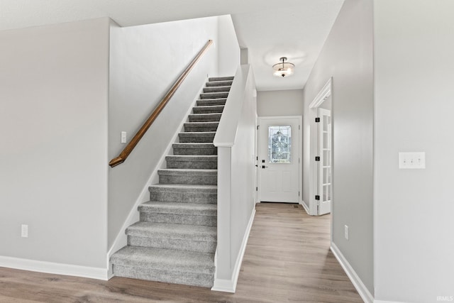 foyer with light hardwood / wood-style floors