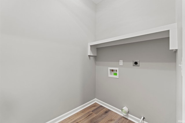 washroom featuring hookup for a washing machine, hardwood / wood-style floors, and hookup for an electric dryer