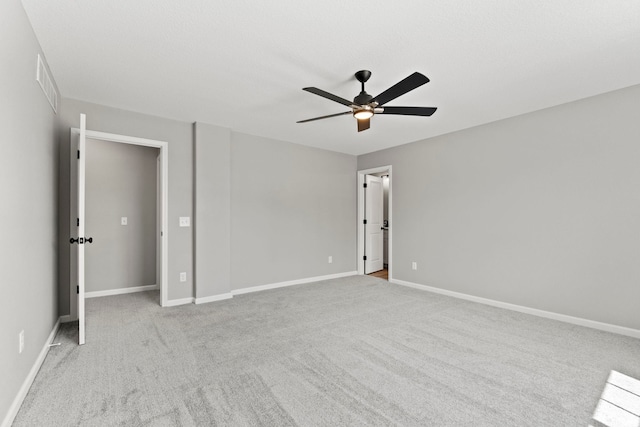 unfurnished bedroom featuring ceiling fan and light colored carpet