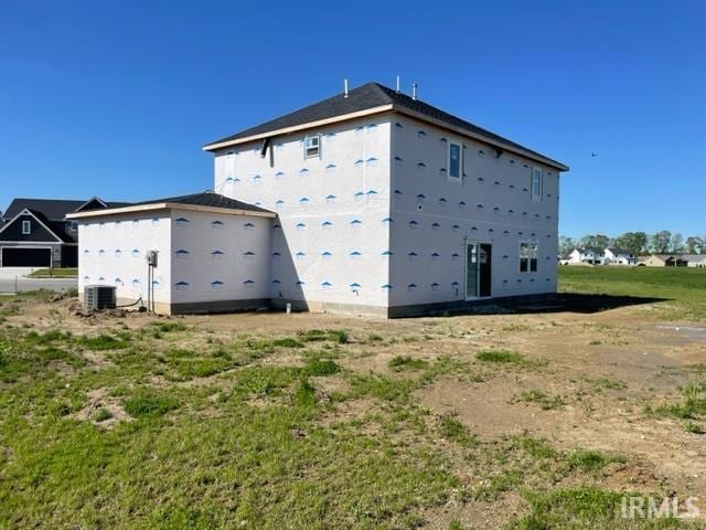 view of home's exterior featuring central AC unit