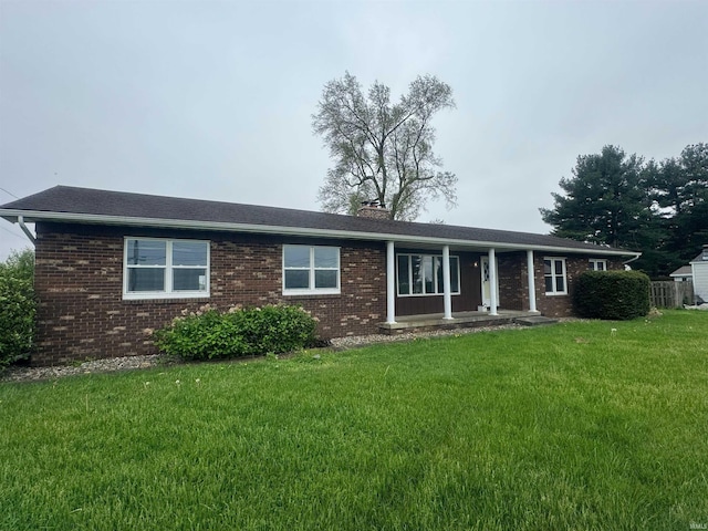 single story home with a front yard