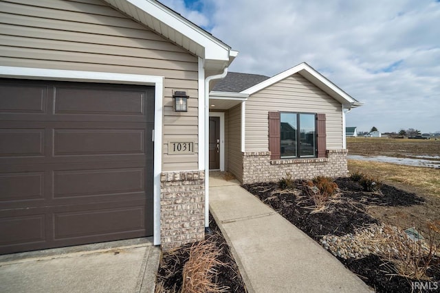 property entrance featuring a garage