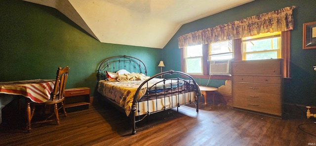 bedroom featuring lofted ceiling and dark wood-type flooring