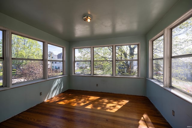 unfurnished sunroom with a wealth of natural light