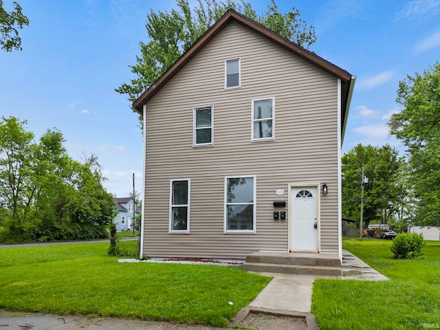 view of property with a front lawn