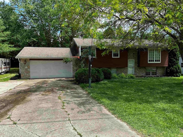 view of front facade with a front yard and a garage