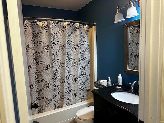 full bathroom featuring vanity, shower / bath combination with curtain, and toilet