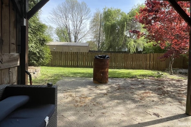 view of patio / terrace featuring fence