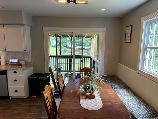 dining area with dark wood-type flooring