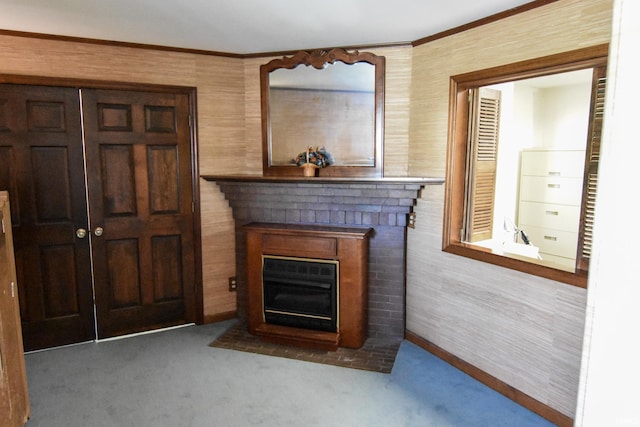 unfurnished living room with dark carpet and a brick fireplace