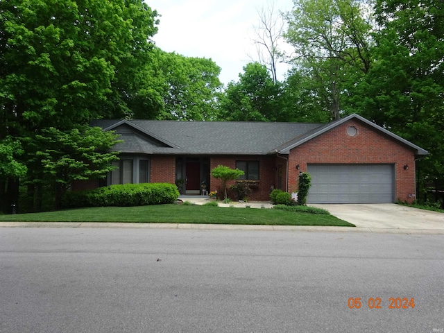 single story home featuring a garage