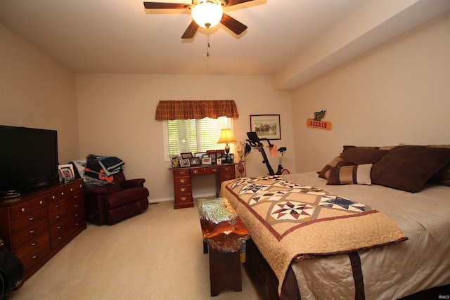 bedroom with ceiling fan and light colored carpet