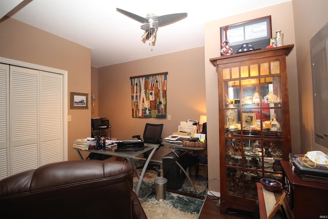 office with ceiling fan and hardwood / wood-style floors