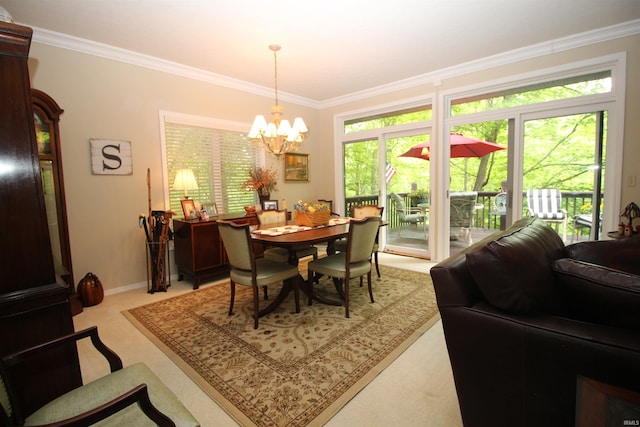 carpeted dining area featuring ornamental molding and a notable chandelier