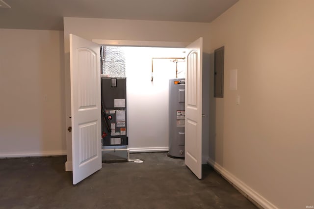 interior space with electric panel, heating unit, and water heater