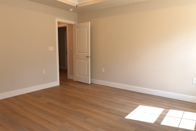 spare room featuring light hardwood / wood-style floors