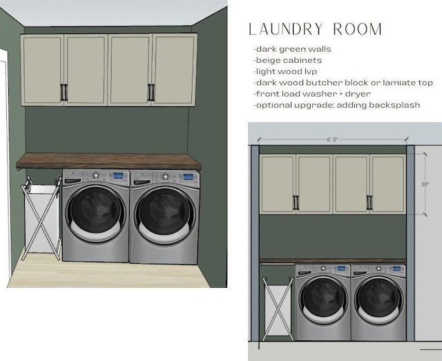 laundry area featuring washing machine and dryer, cabinets, and wood-type flooring