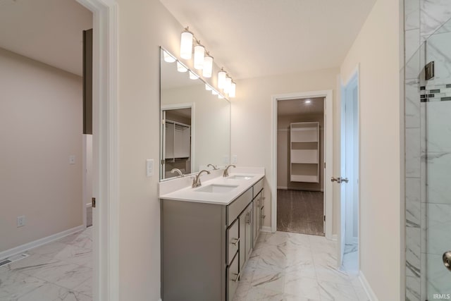 bathroom featuring tile flooring, large vanity, and dual sinks