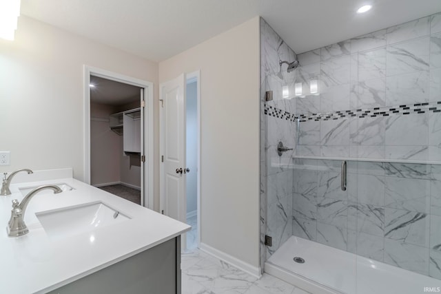 bathroom featuring tile floors, a shower with door, and vanity