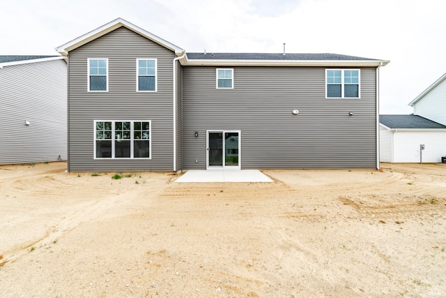 back of property featuring a patio