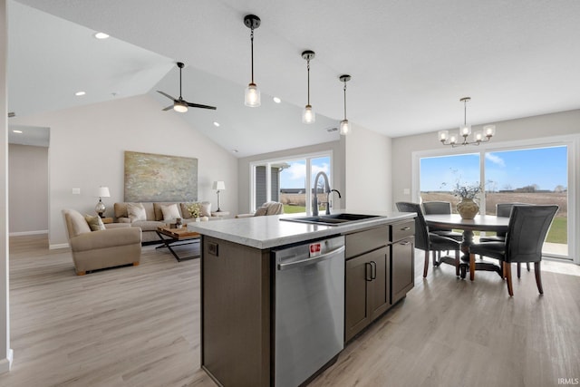 1016 Bryce Cir, Ligonier, IN 46767 - kitchen with plenty of natural light, stainless steel dishwasher, a sink, and light wood-style flooring
