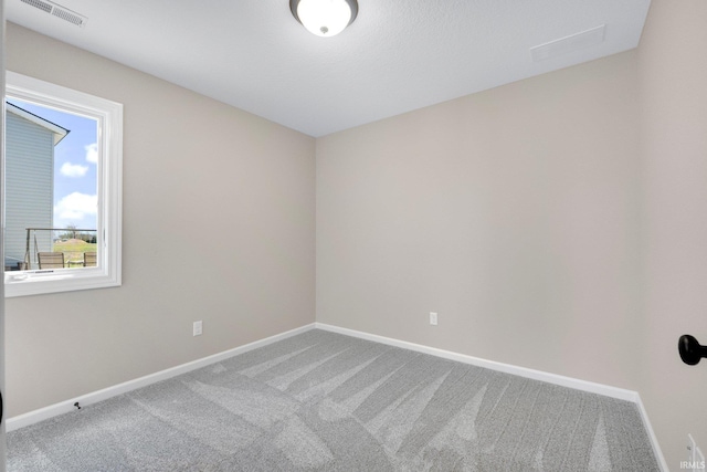 1016 Bryce Cir, Ligonier, IN 46767 - carpeted spare room with baseboards and visible vents