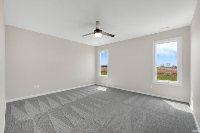 1016 Bryce Cir, Ligonier, IN 46767 - empty room featuring baseboards, a ceiling fan, visible vents, and carpet