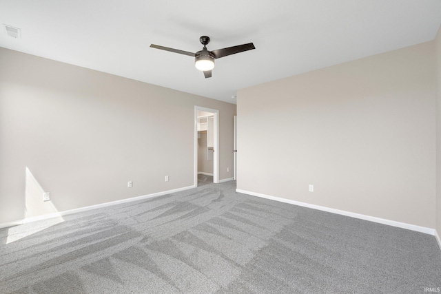 1016 Bryce Cir, Ligonier, IN 46767 - empty room featuring carpet floors, visible vents, a ceiling fan, and baseboards