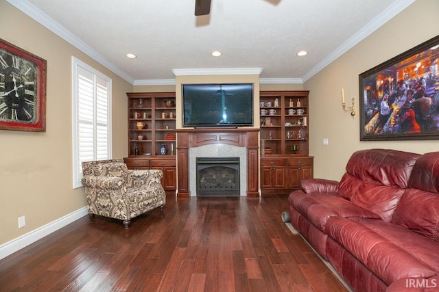 living room featuring dark hardwood / wood-style floors and crown molding