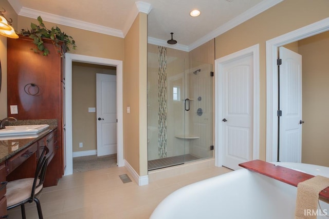 bathroom featuring separate shower and tub, vanity, tile floors, and ornamental molding